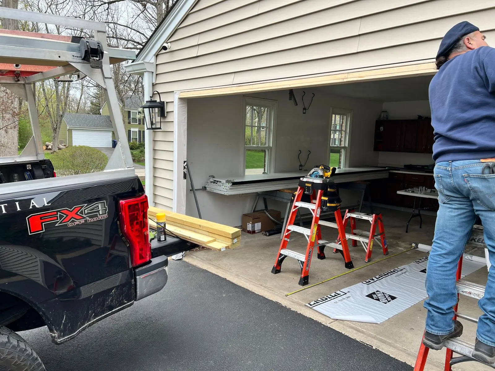 Garage door jamb repair materials prepared for exterior opening repair